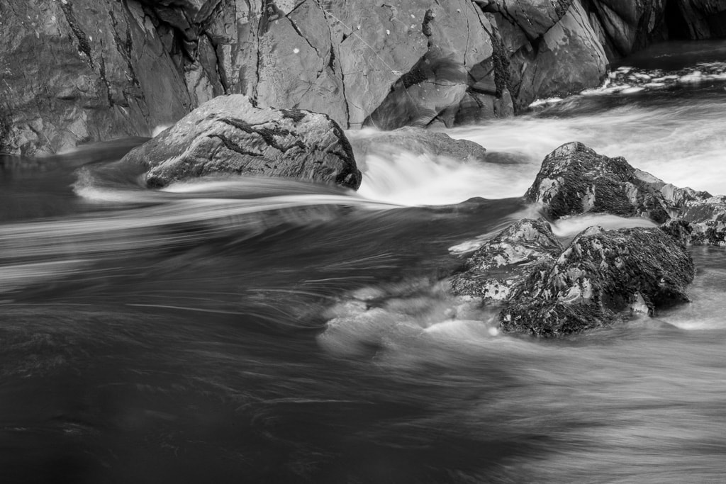 Rocks and water, monochrome long exposure, Snowdonia, North Wales